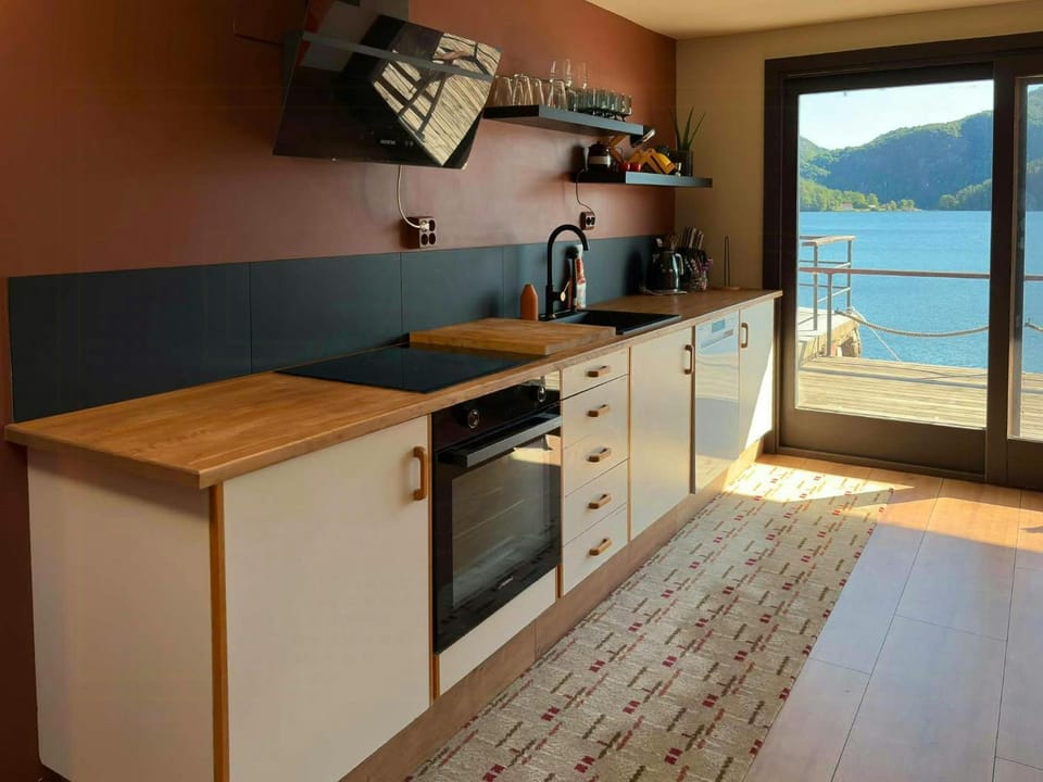 Retro beach house with jetty in Aptafjorden House in Rogaland