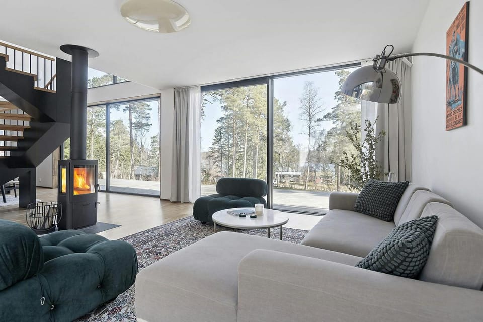 Airy house with large glass fronts on Adelso House in Stockholm County