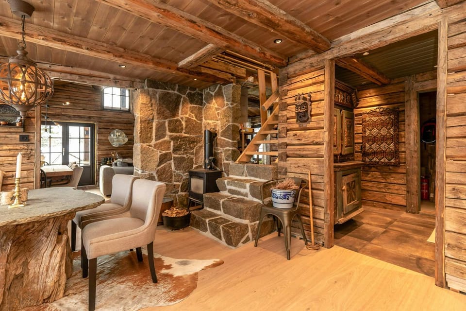 Timber cabin with stone fireplace and fell views Cabin in Viken, Norway