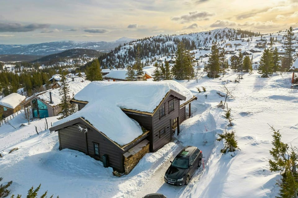Timber cabin with stone fireplace and fell views Cabin in Viken, Norway