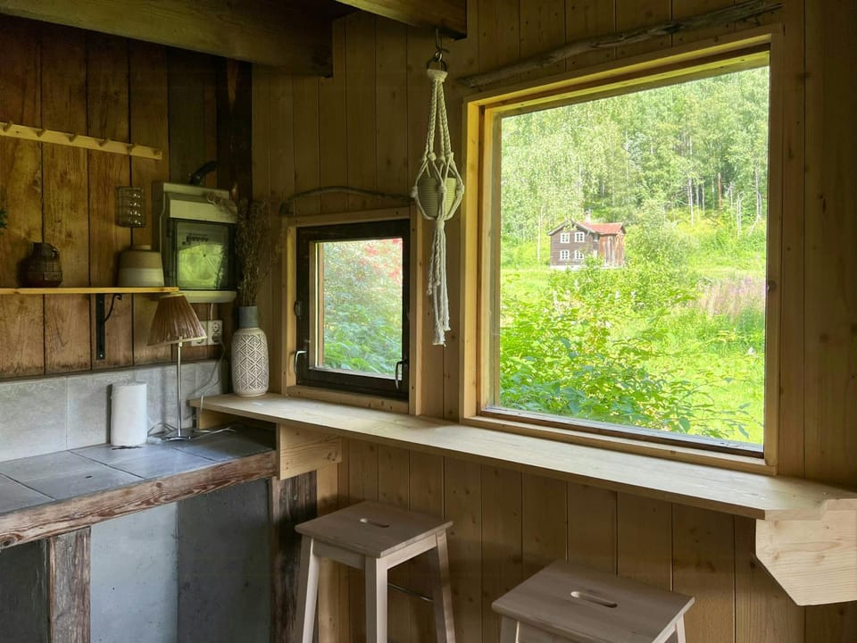 Log cottage with sauna on historic family farm Apartment in Viken, Norway