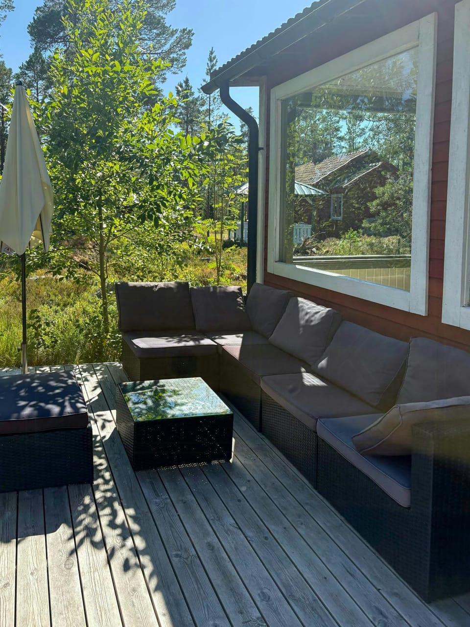 Colourful home by Sorfjarden's sandy beach House in Sweden