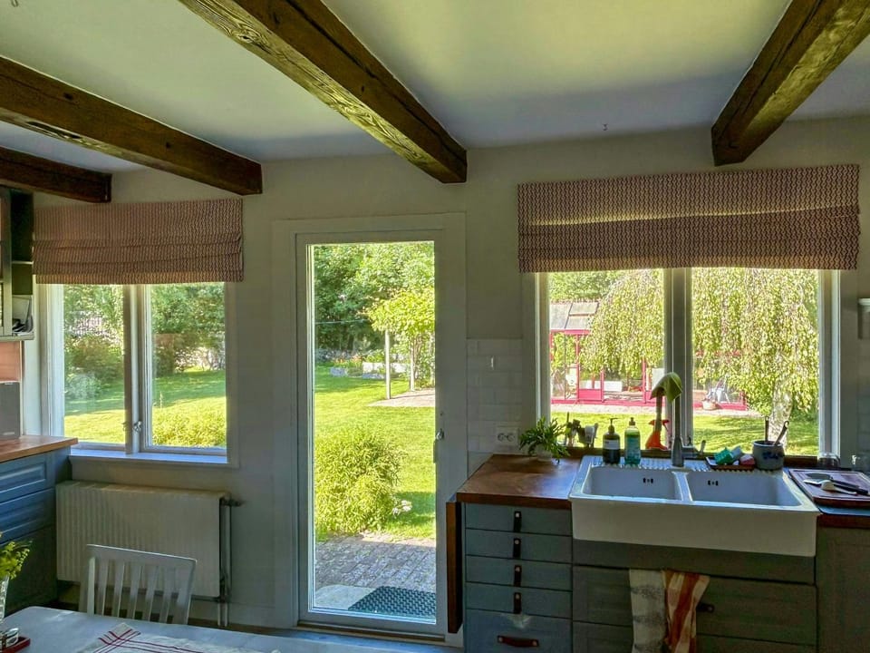 Farmhouse with view towards Kullaberg House in Skåne County