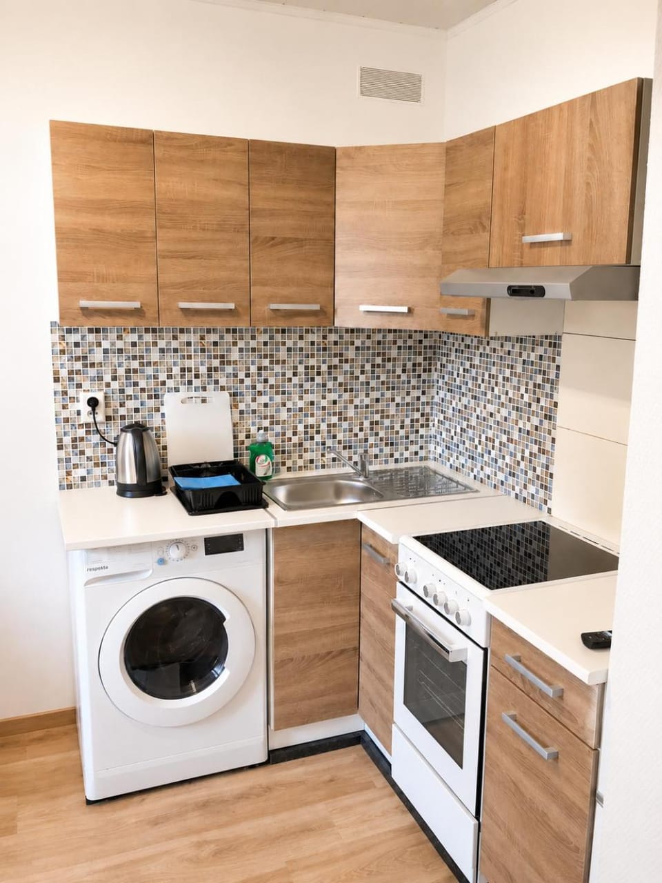 Kitchen or kitchenette, oven, stove, washing machine