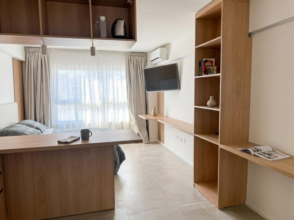 Communal lounge/ TV room, Bed, TV and multimedia, Photo of the whole room, Evening entertainment, Bedroom, hair dresser, wardrobe, air conditioner