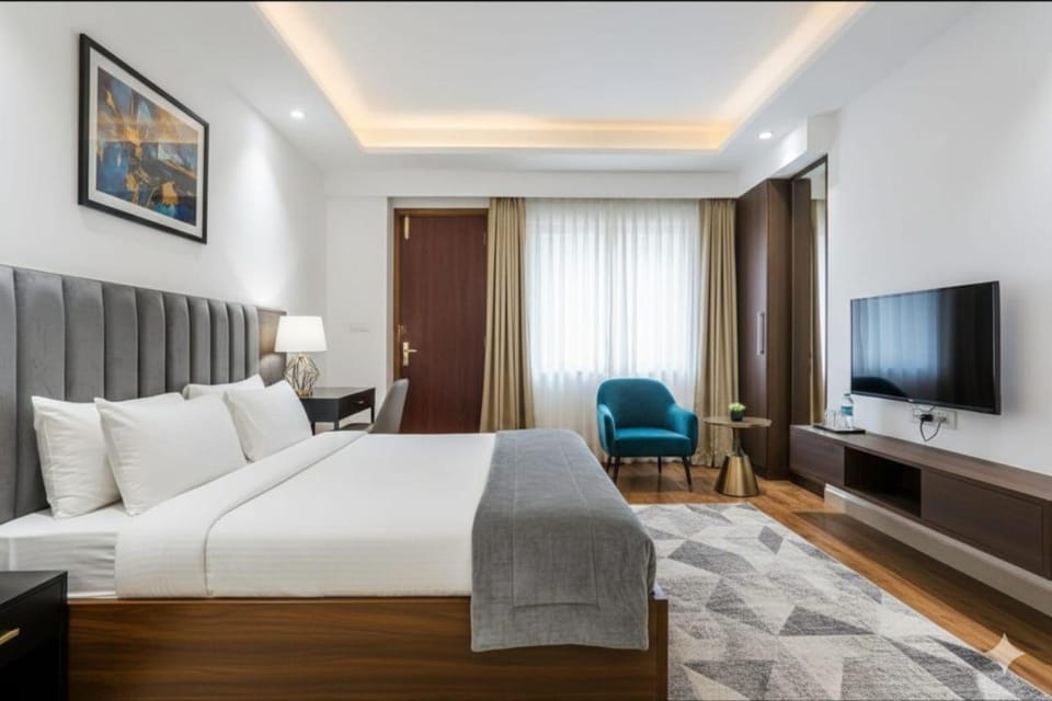 Communal lounge/ TV room, Bed, TV and multimedia, Living room, Photo of the whole room, Seating area, Evening entertainment, Bedroom