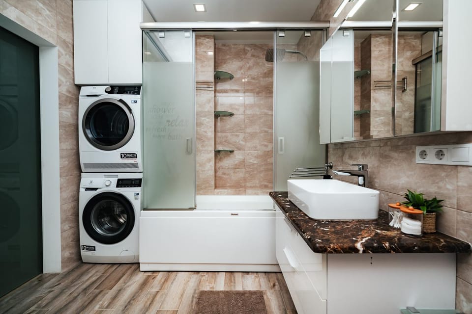 Shower, Bathroom, towels, washing machine, dryer