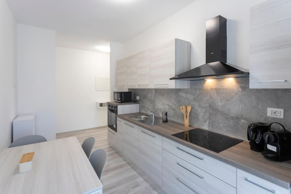 Kitchen or kitchenette, stove, toaster