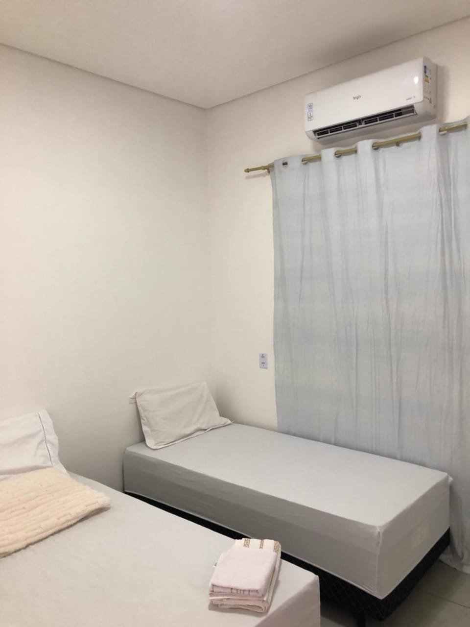 Bed, Photo of the whole room, Bedroom, towels, air conditioner