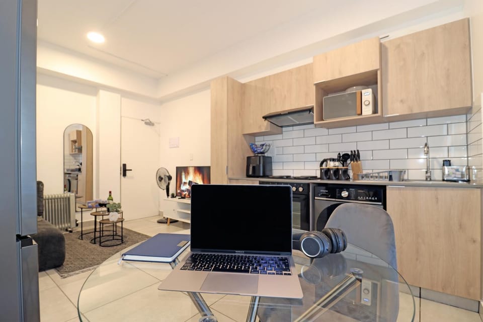 Dining area, microwave, stove, washing machine, kitchen