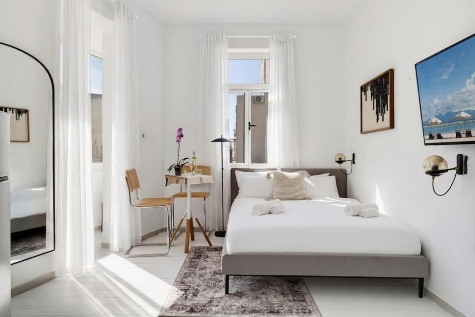 Sea Breeze Neighborhood Magic the Sunlit Studio Apartment in Herzliya