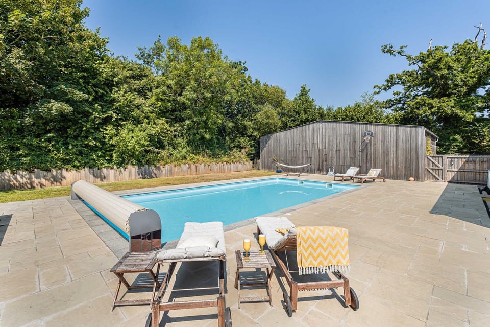 Patio, Day, Natural landscape, Pool view, Swimming pool, sunbed