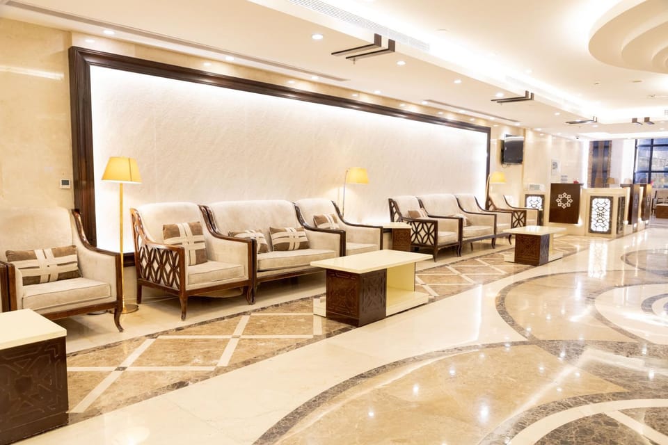 Property building, TV and multimedia, Lobby or reception, Seating area, air conditioner