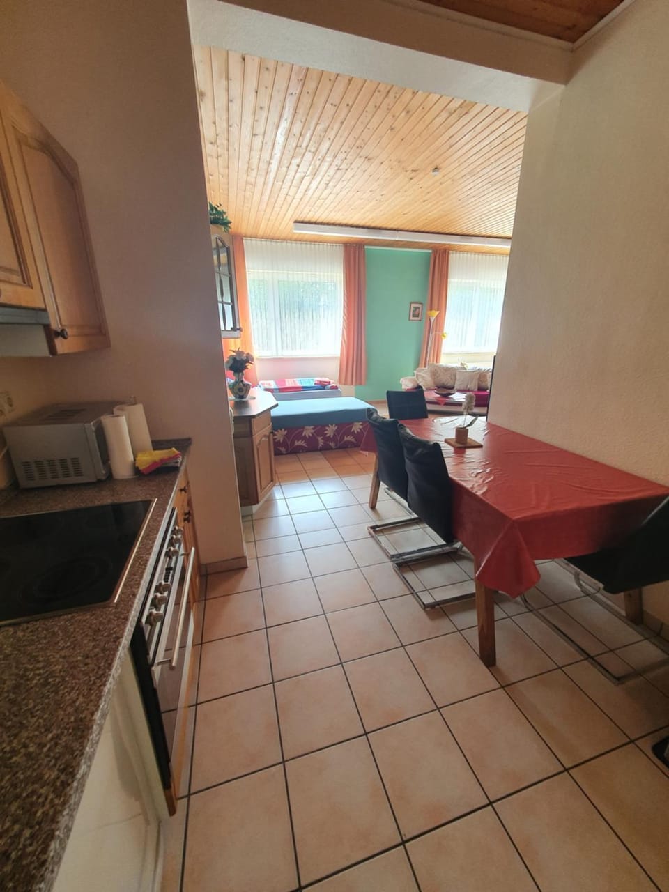 Kitchen or kitchenette, Living room, Seating area, Dining area