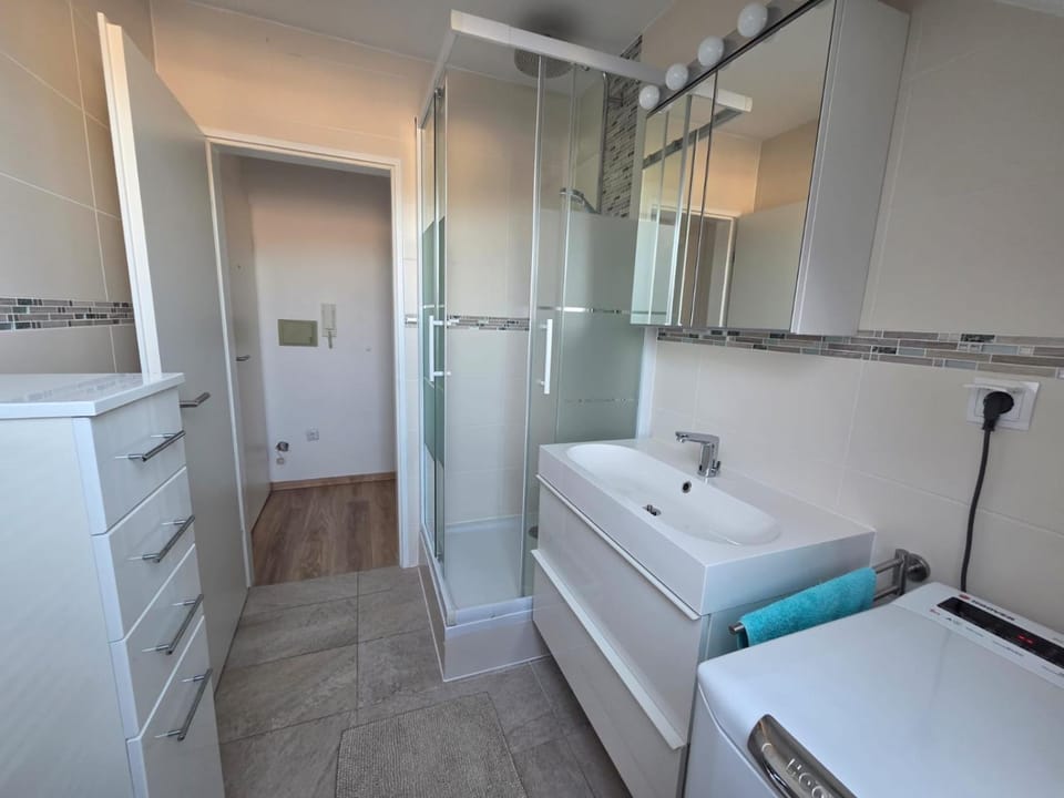 Shower, washing machine