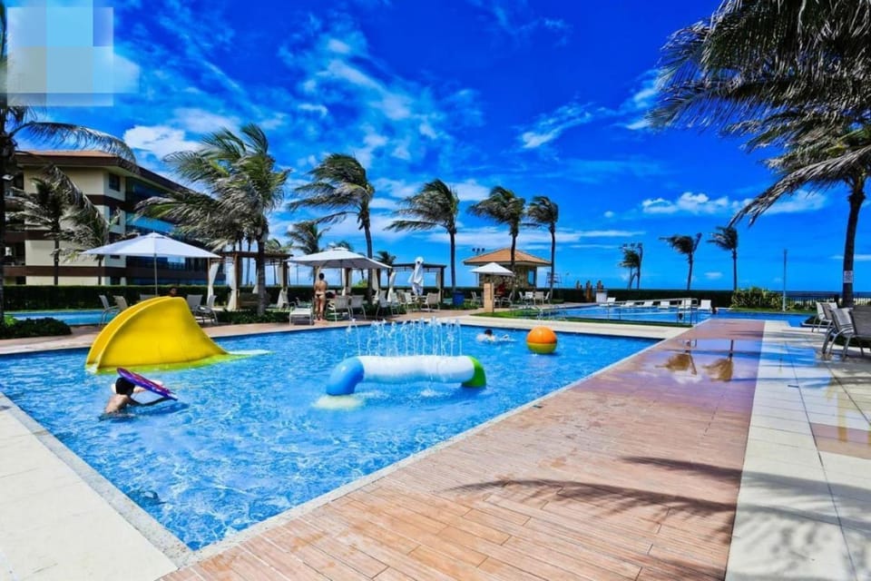 Property building, Day, Pool view, Swimming pool, sunbed