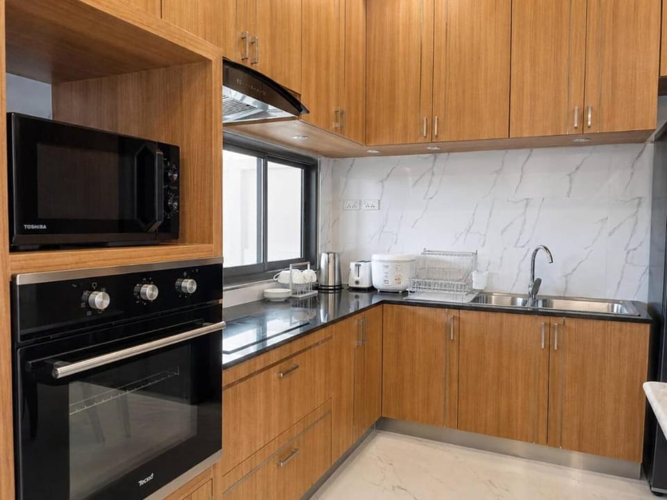 Kitchen or kitchenette, oven, stove, toaster