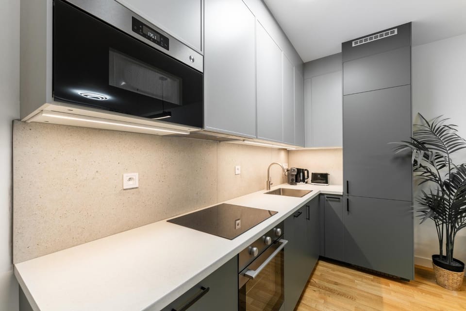Kitchen or kitchenette, microwave, oven, stove, toaster