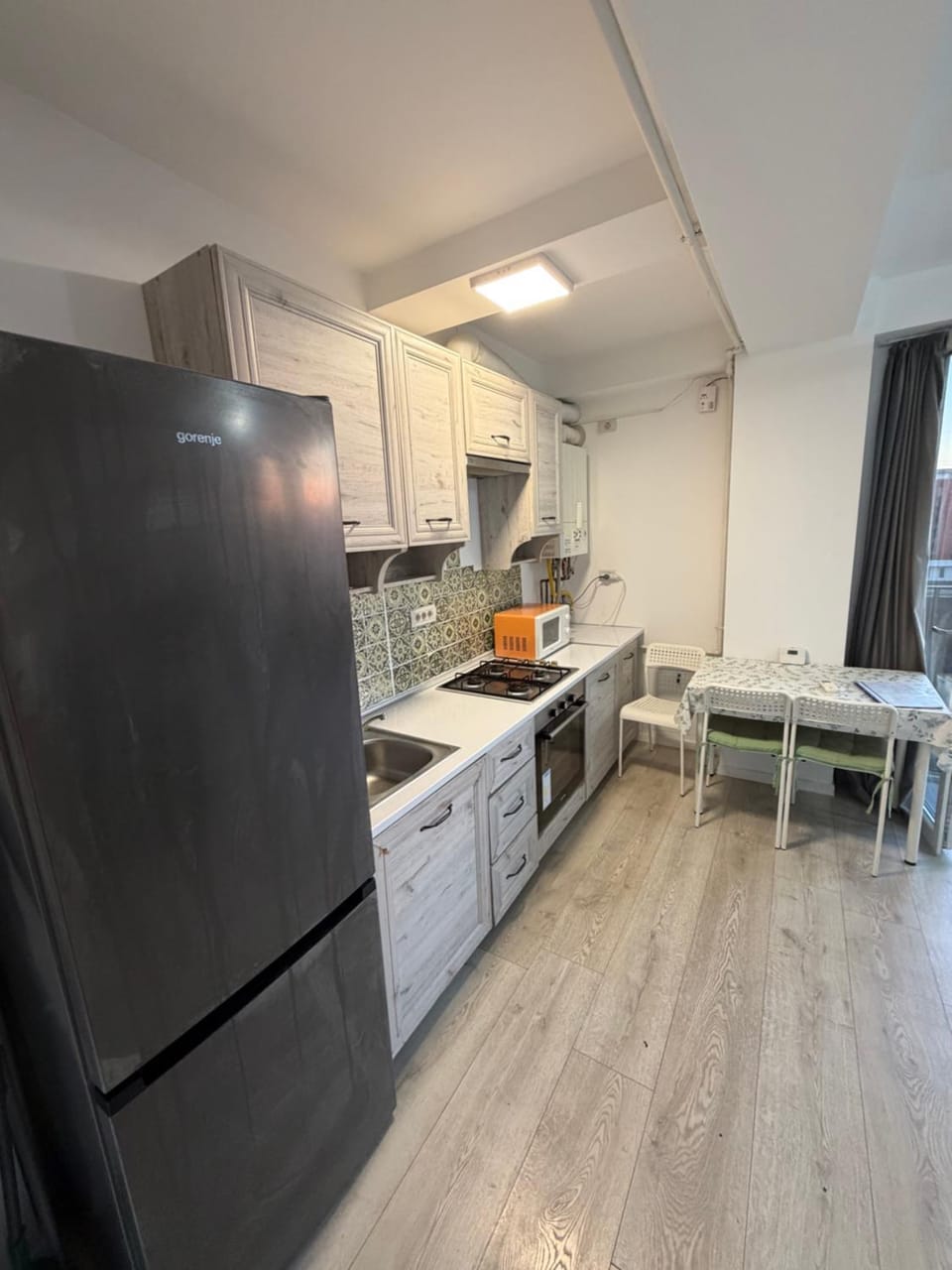 Kitchen or kitchenette, oven, stove