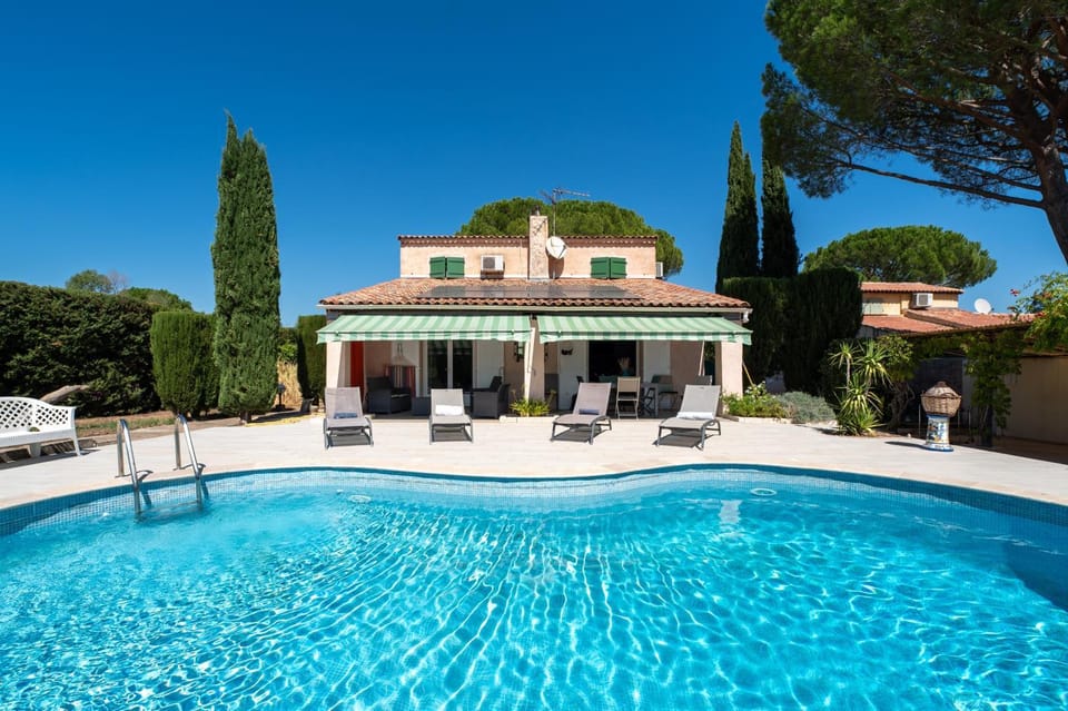 Property building, Living room, Swimming pool