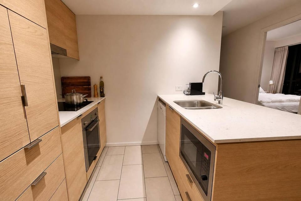 Kitchen or kitchenette, microwave, oven, stove