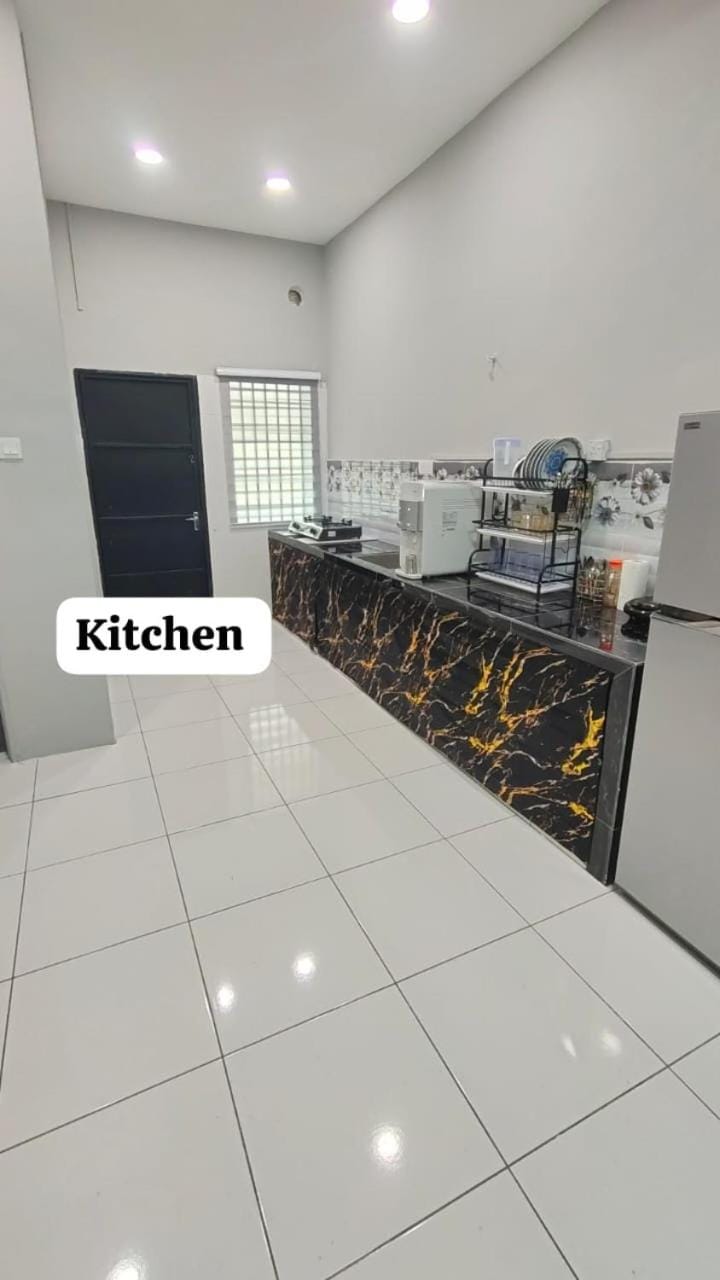 RL Cozy Stay House in Perak Tengah District