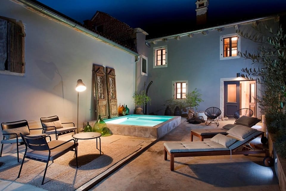 Patio, Night, Seating area, Pool view, Swimming pool