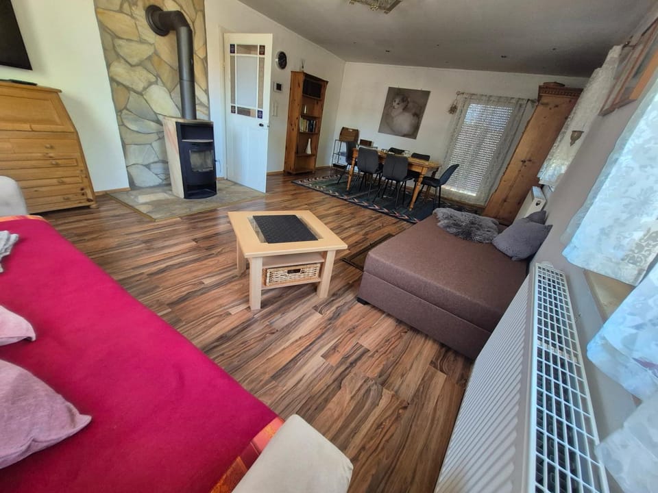 Bed, Living room, Seating area, Dining area