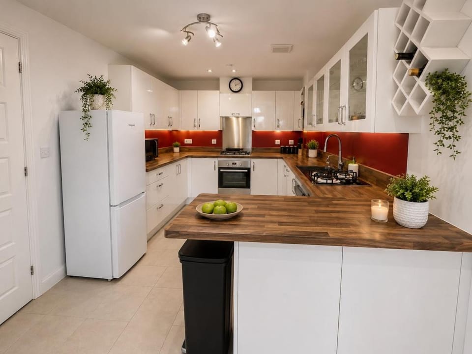 Kitchen or kitchenette, dishwasher, oven, stove, toaster