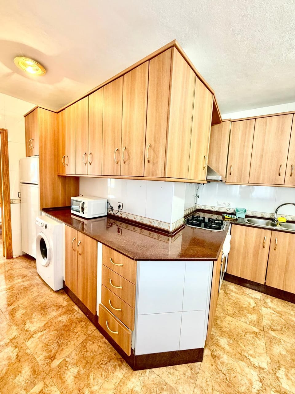 Kitchen or kitchenette, oven, stove