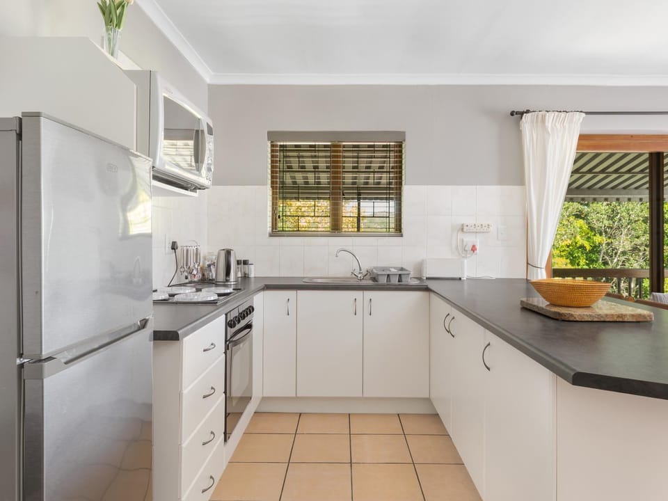 Kitchen or kitchenette, oven, stove