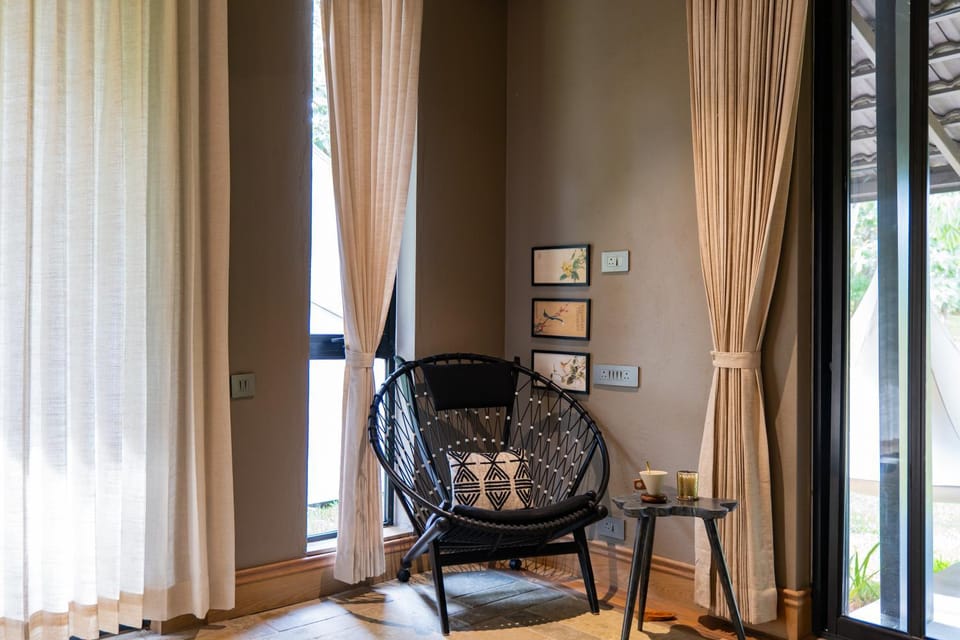 ELIVAAS PRIVE Sravasthi Villa 3 BHK Forest-View Villa With Private Jacuzzi, Sunken Fire Pit, Garden , Gazebo & Covered Terrace With Pool Table Villa in Karnataka