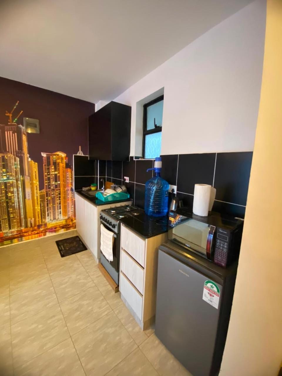Kitchen or kitchenette, oven
