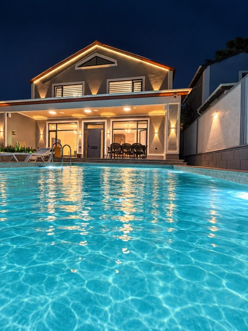 Property building, Night, Pool view, Swimming pool, sunbed