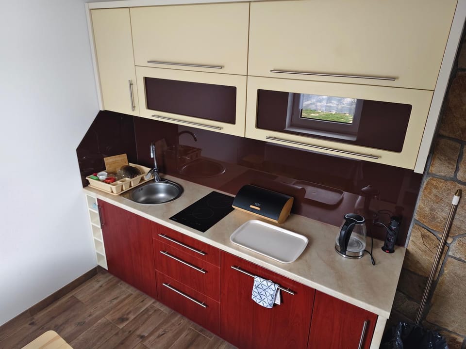 Kitchen or kitchenette, stove