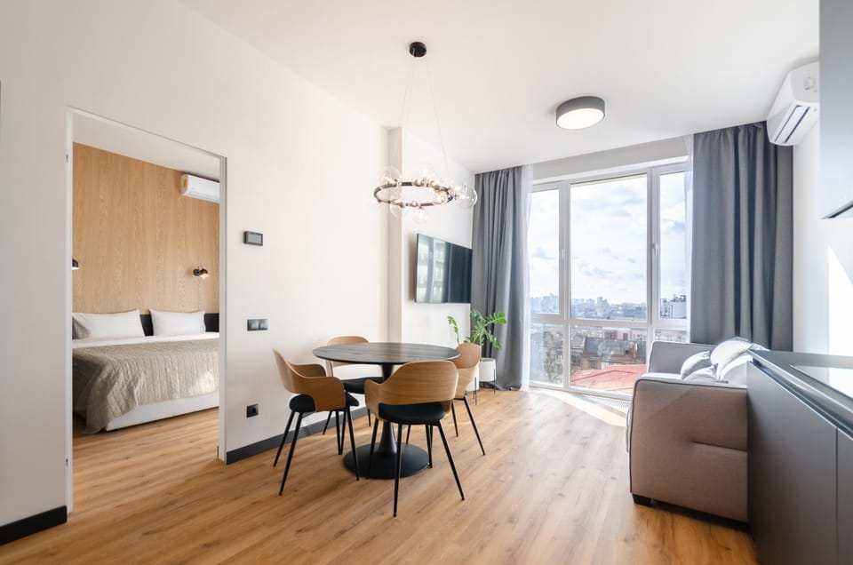 Bed, TV and multimedia, Living room, Seating area, Dining area