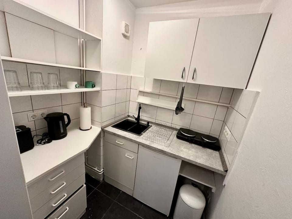 Kitchen or kitchenette, stove, toaster