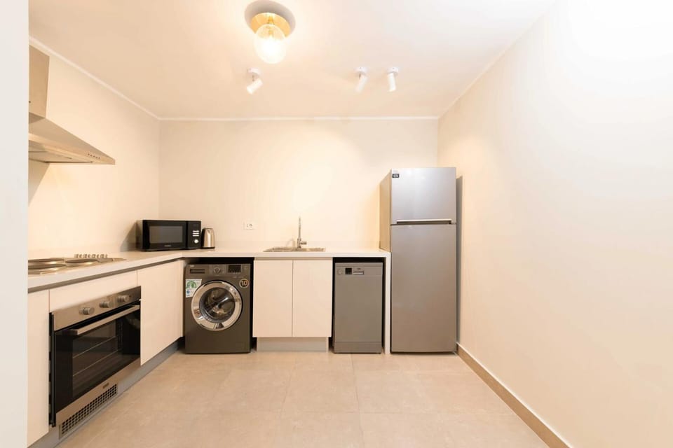 Kitchen or kitchenette, dishwasher, stove, washing machine