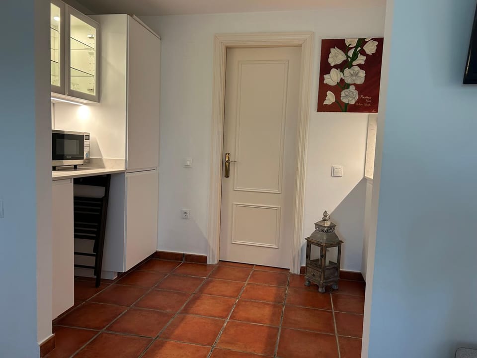Kitchen or kitchenette, stove