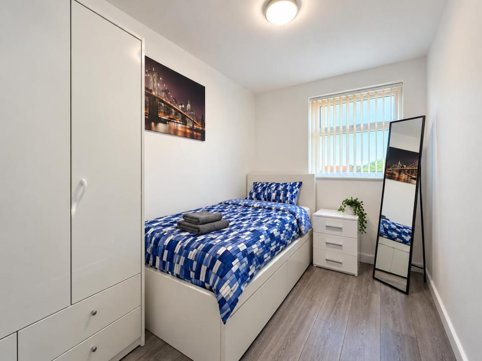 Bed, Photo of the whole room, Bedroom, flat iron, hair dryier, heating, storage, towels, wardrobe