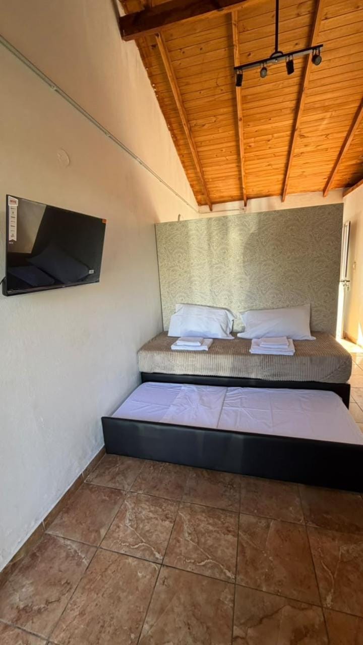 Communal lounge/ TV room, Bed, Photo of the whole room, Bedroom