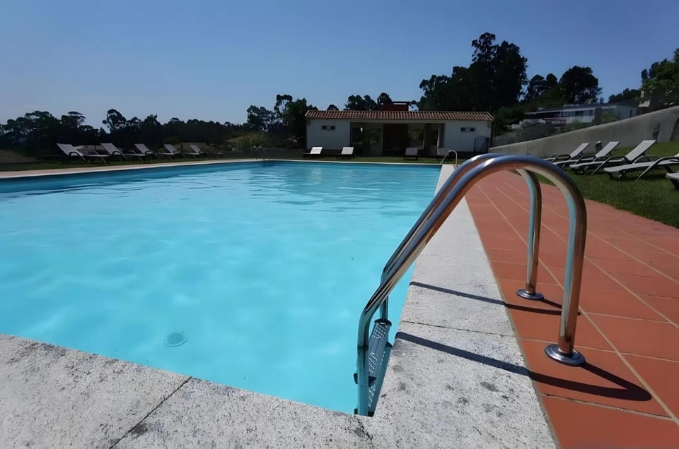 Property building, Living room, Swimming pool