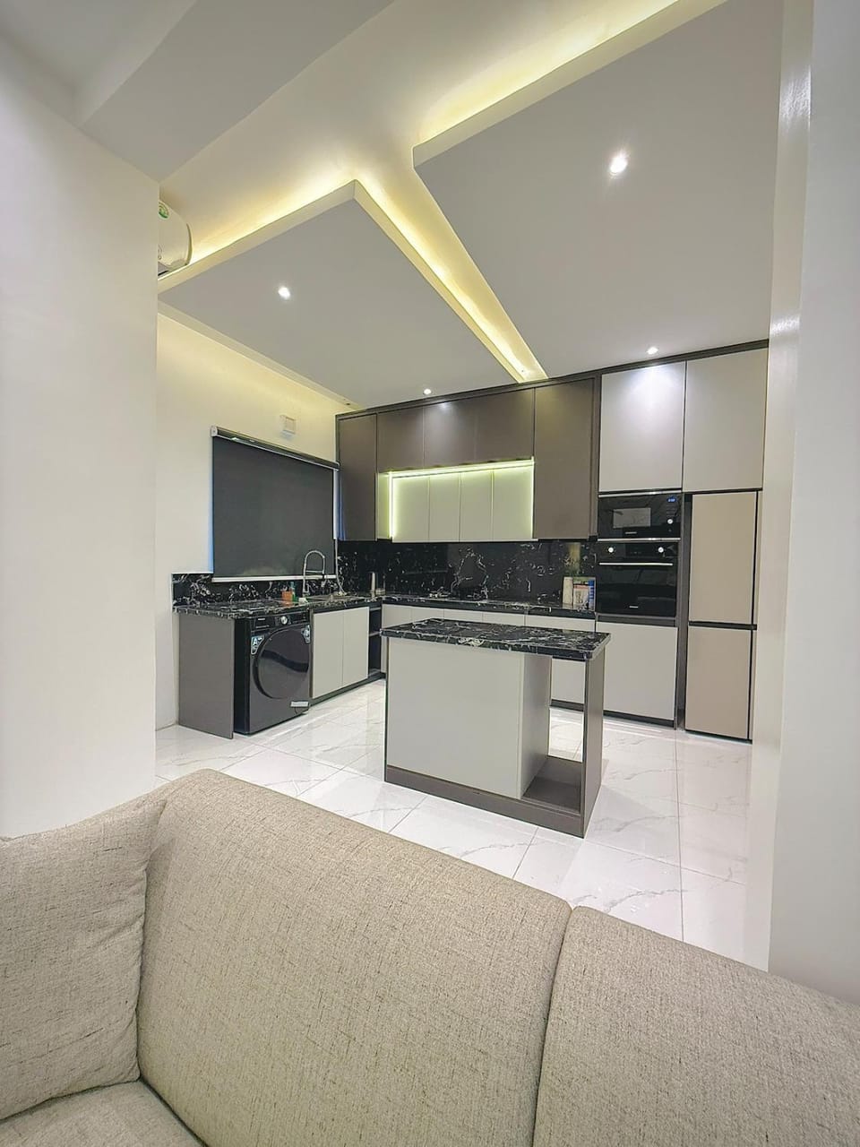 Kitchen or kitchenette, dishwasher, oven, stove