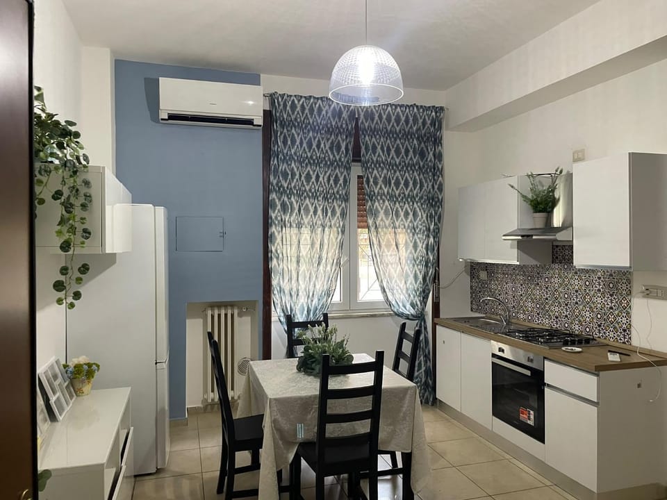 Kitchen or kitchenette, Seating area, Dining area, oven, stove, air conditioner