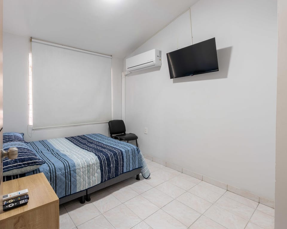 Photo of the whole room, air conditioner