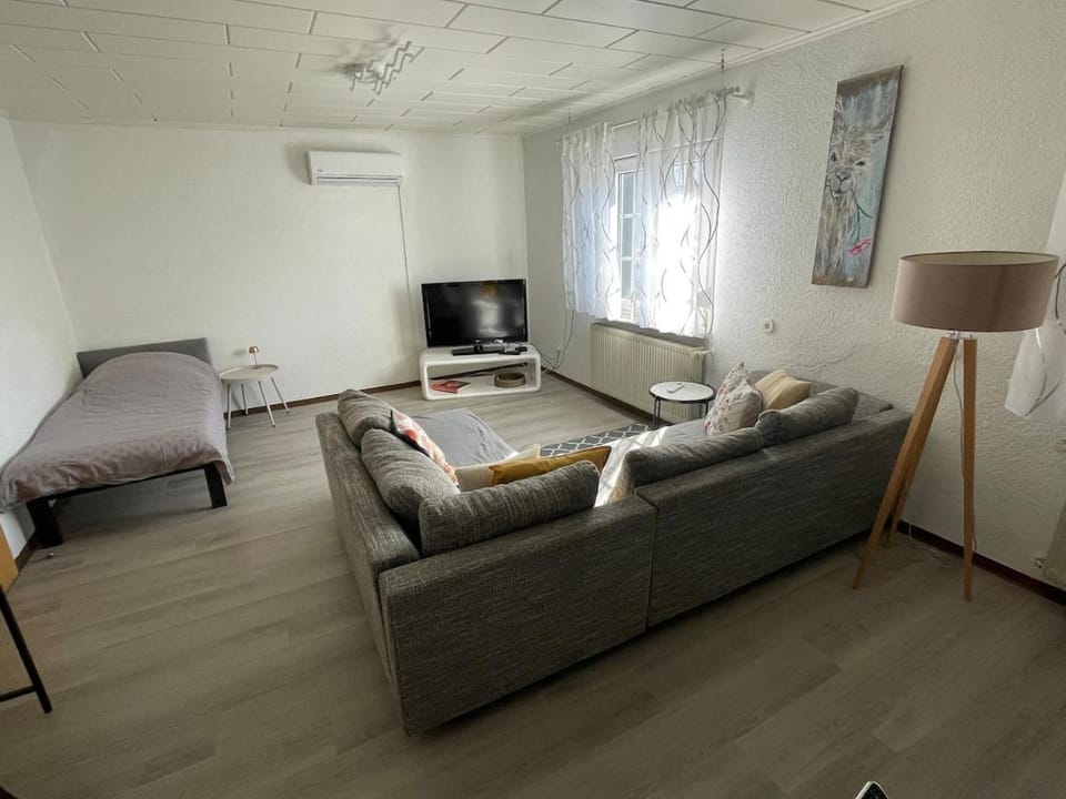 Bed, Photo of the whole room, Seating area, air conditioner