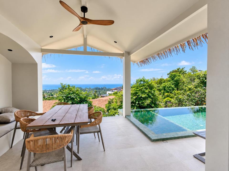 Patio, Day, View (from property/room), Seating area, Dining area, Pool view, Sea view, Swimming pool
