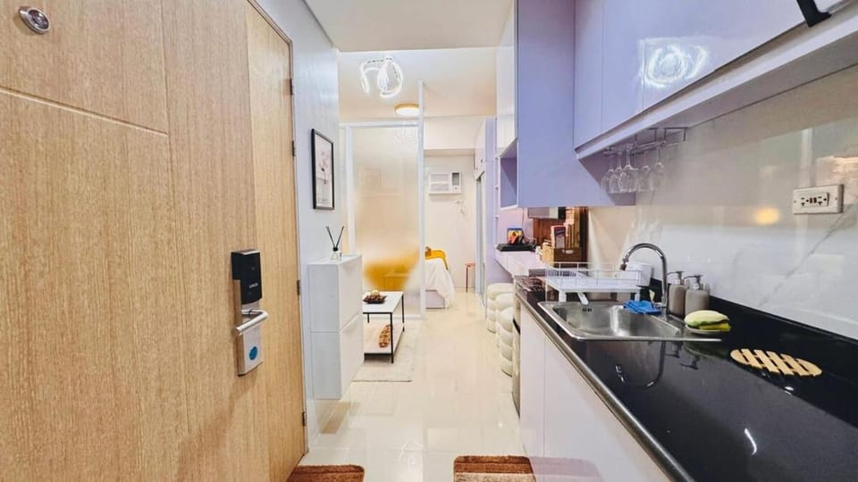 Mid century at Grass Residences staycation Apartment in Quezon City