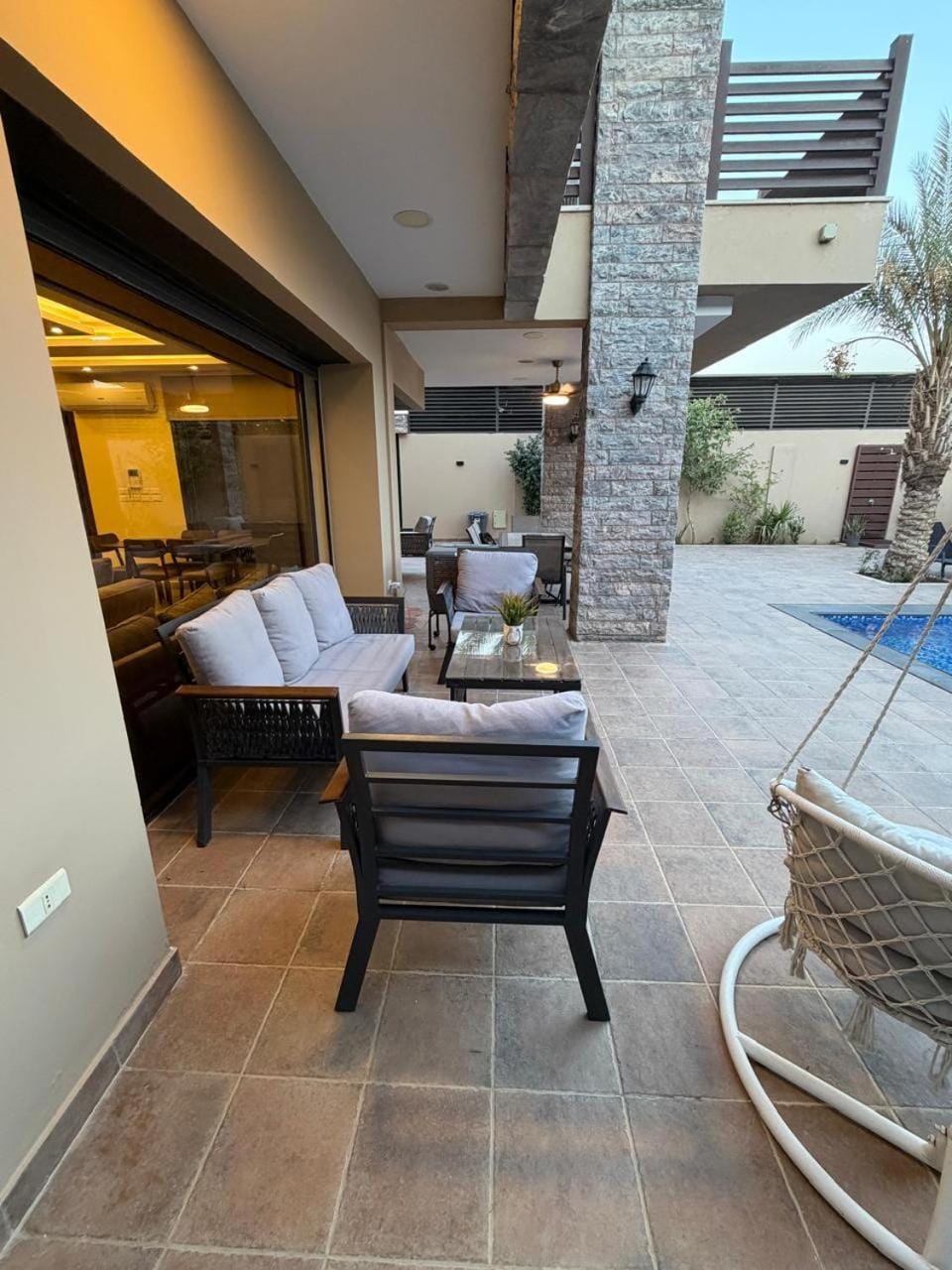 Property building, Patio, Day, View (from property/room), Balcony/Terrace, Living room, Seating area, Dining area
