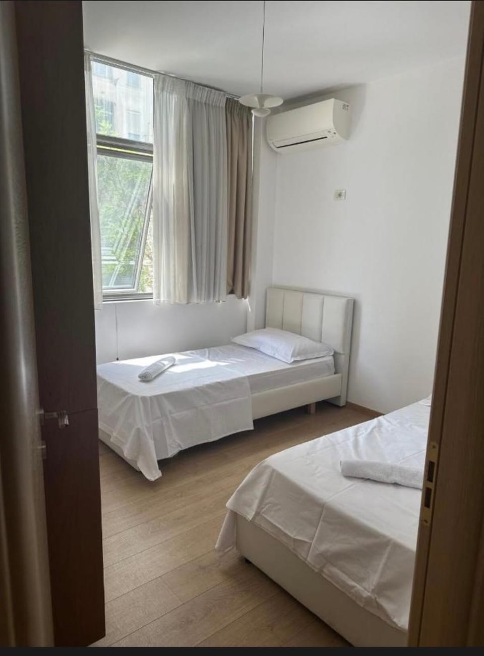 Bed, Photo of the whole room, Bedroom, towels, air conditioner